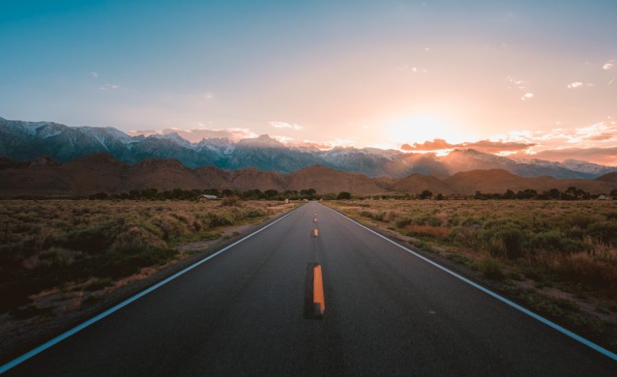 straight-road-middle-desert-with-magnificent-mountains-sunset